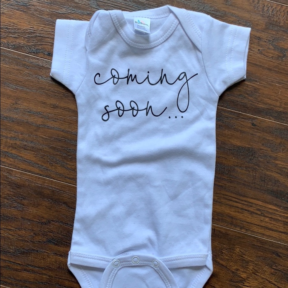 Coming soon announcement shirt.